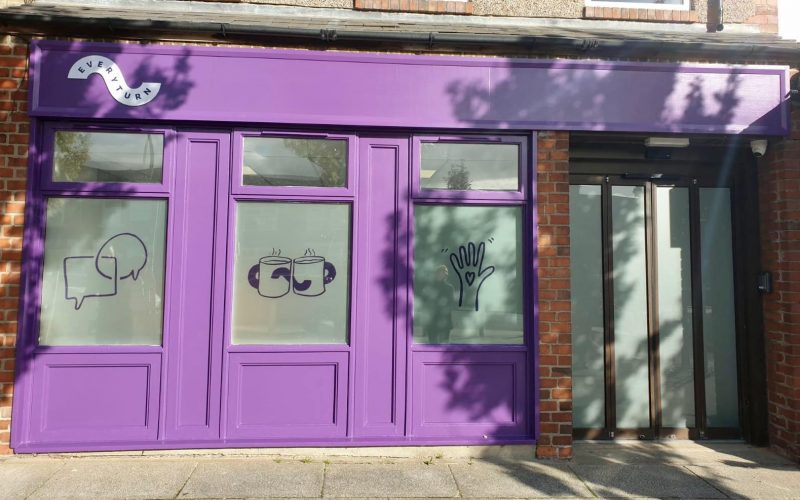 A purple shop-front showing Everyturn Mental Health branding