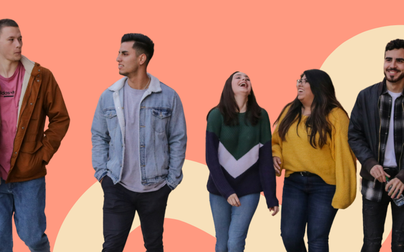 An orange background behind five casually-dressed young people walking, talking, and laughing.